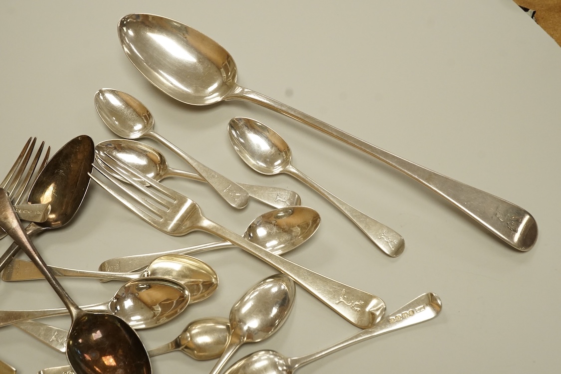 A small quantity of assorted 19th century silver flatware, various patterns, dates and makers, including a set of nine Old English pattern teaspoons, William Chawner II, London, 1833, an Old English pattern basting spoon